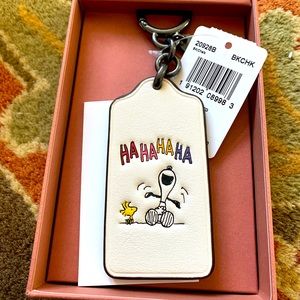 Coach NIB Snoopy and Woodstock key chain.